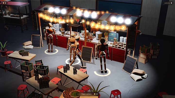 A lantern lit night market food stall with customers queuing between crates and stools